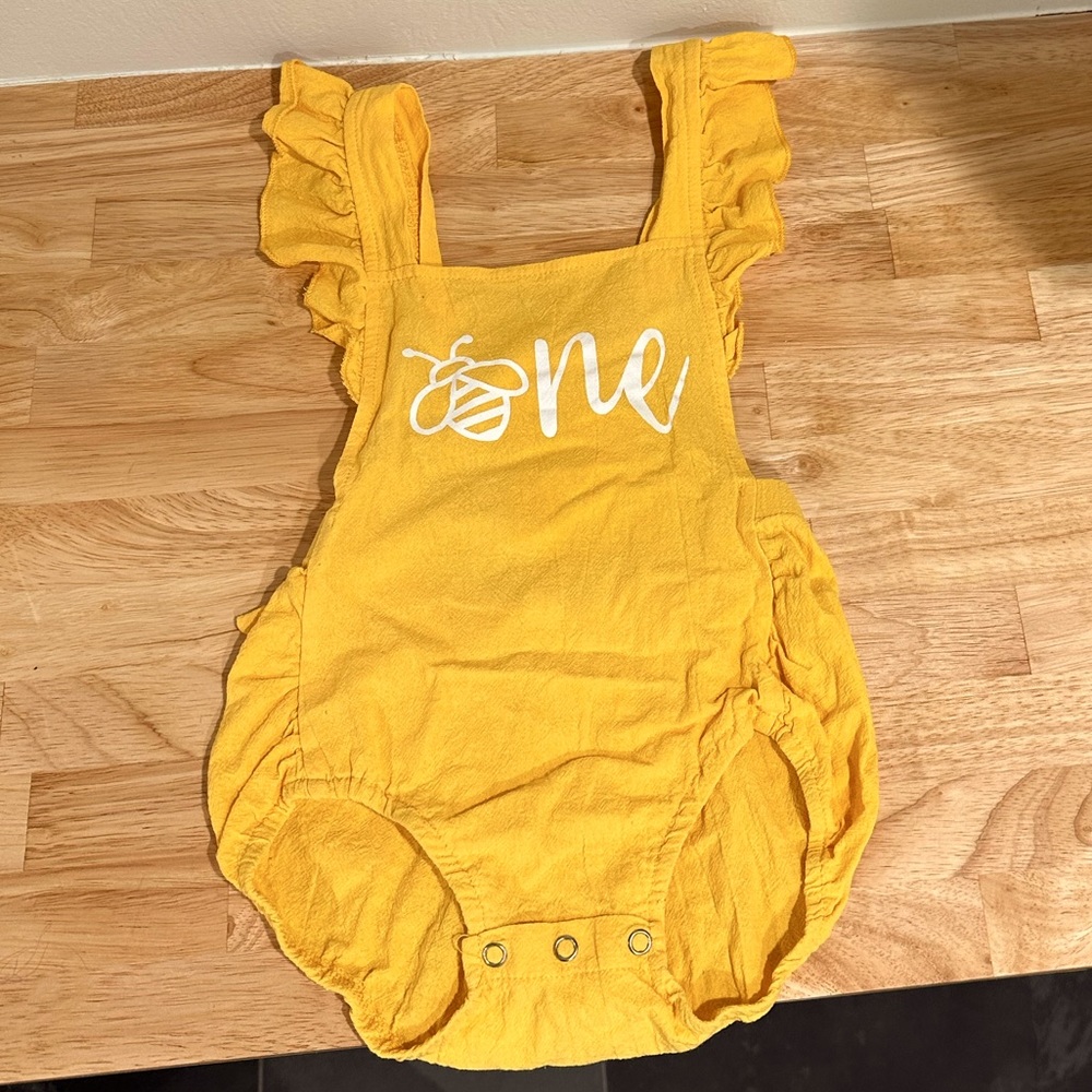Yellow 'One' Ruffle Strap Baby One-Piece